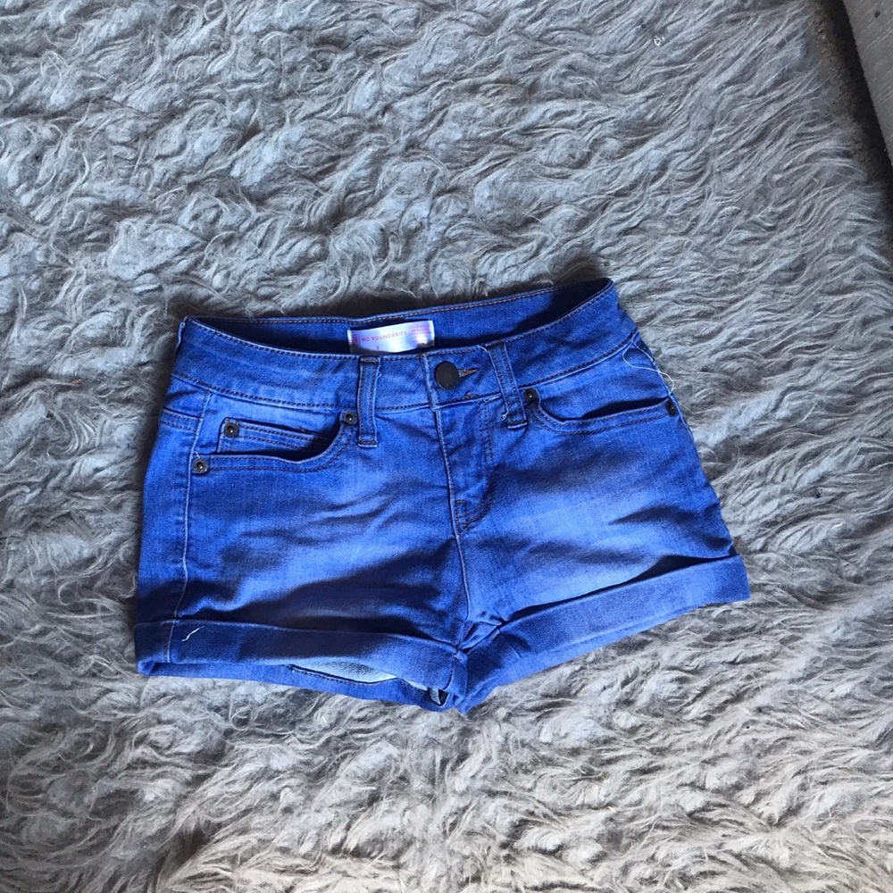 Jegging material vibrant dark wash jean shorts